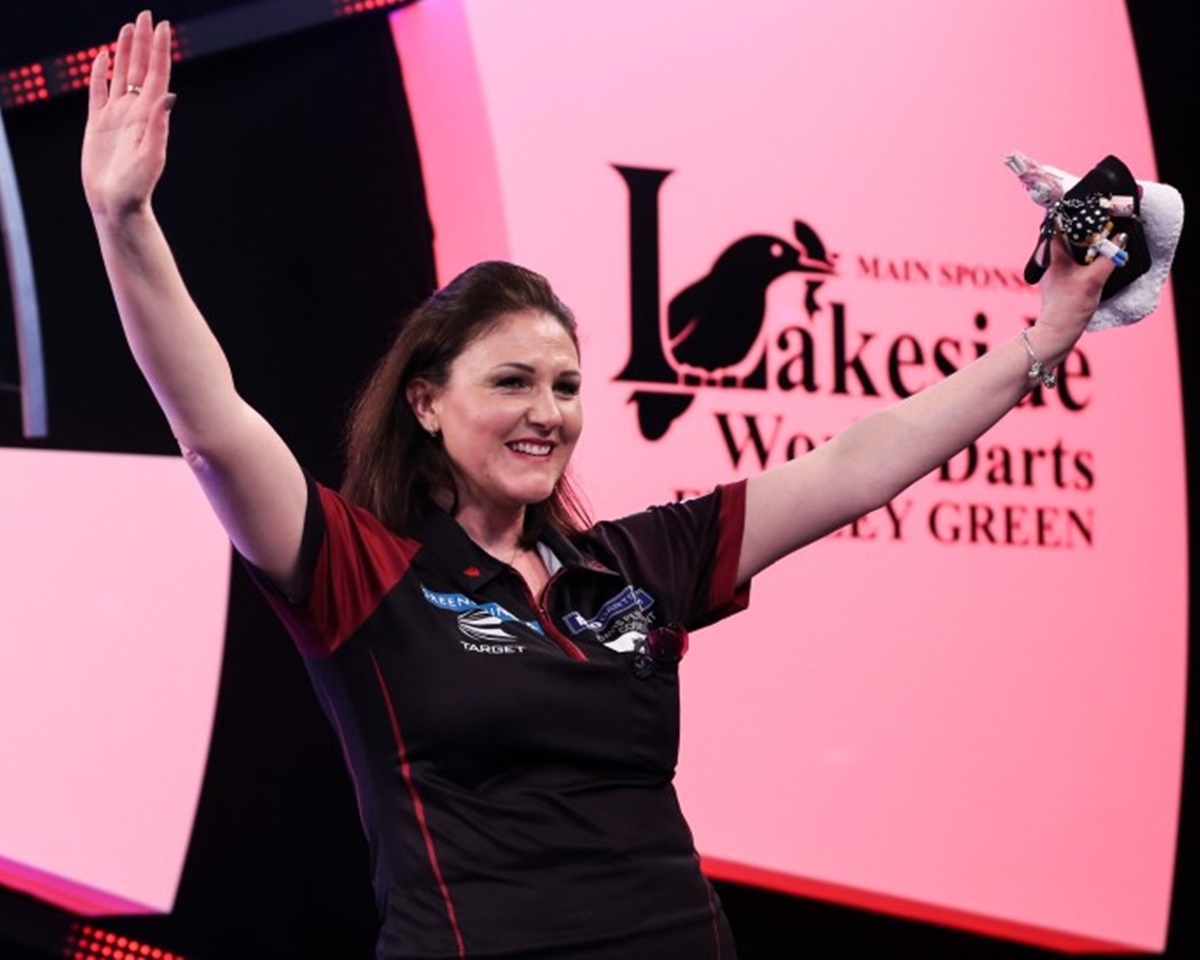 Lorraine Winstanley, co-owner, celebrating a darts win
